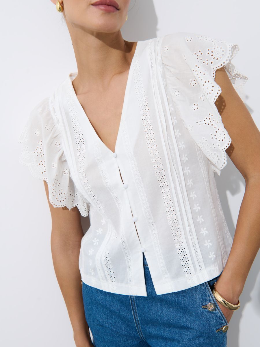 Volangiga valge pluus