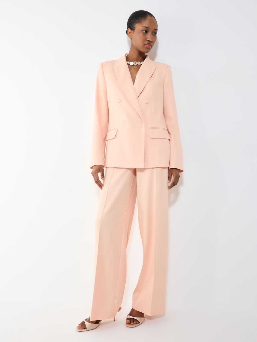 Spodnie wide leg - brzoskwiniowy - MOHITO