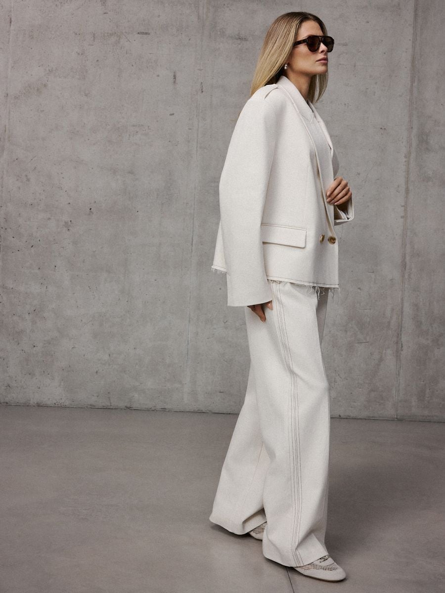 Kremowe spodnie wide leg Kremowe spodnie wide leg - kremowy - MOHITO