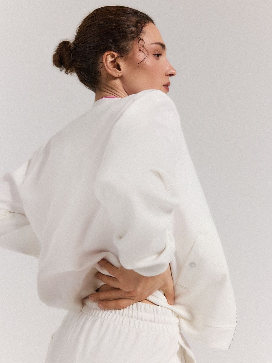 Rozpinana kremowa bluza Rozpinana kremowa bluza - kremowy - MOHITO