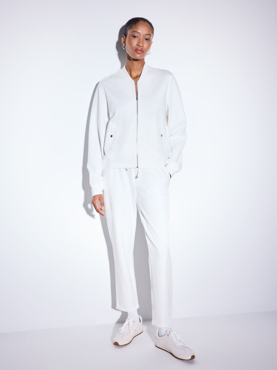 Spodnie dresowe - kremowy - MOHITO