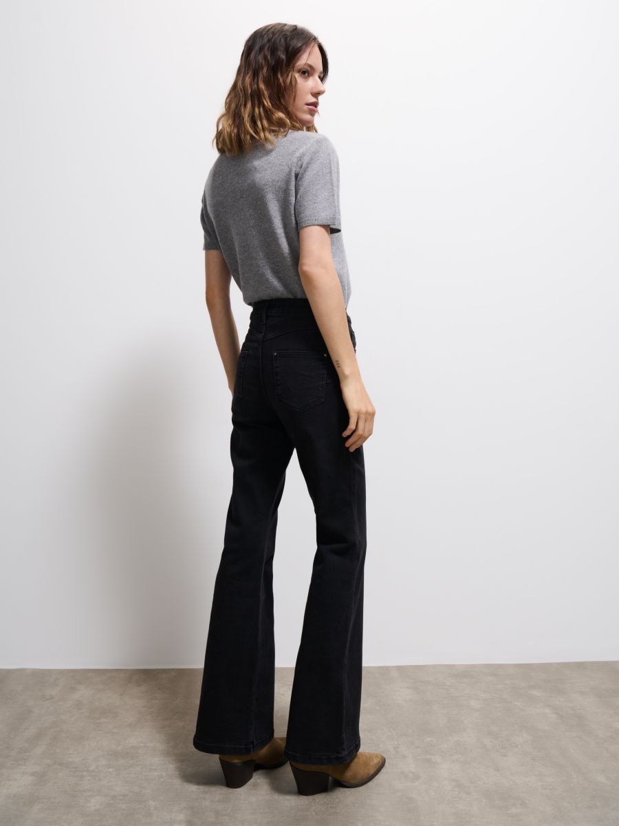 Jeansy flare push up - czarny - MOHITO