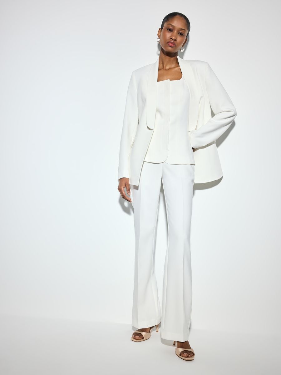 Spodnie flare - kremowy - MOHITO