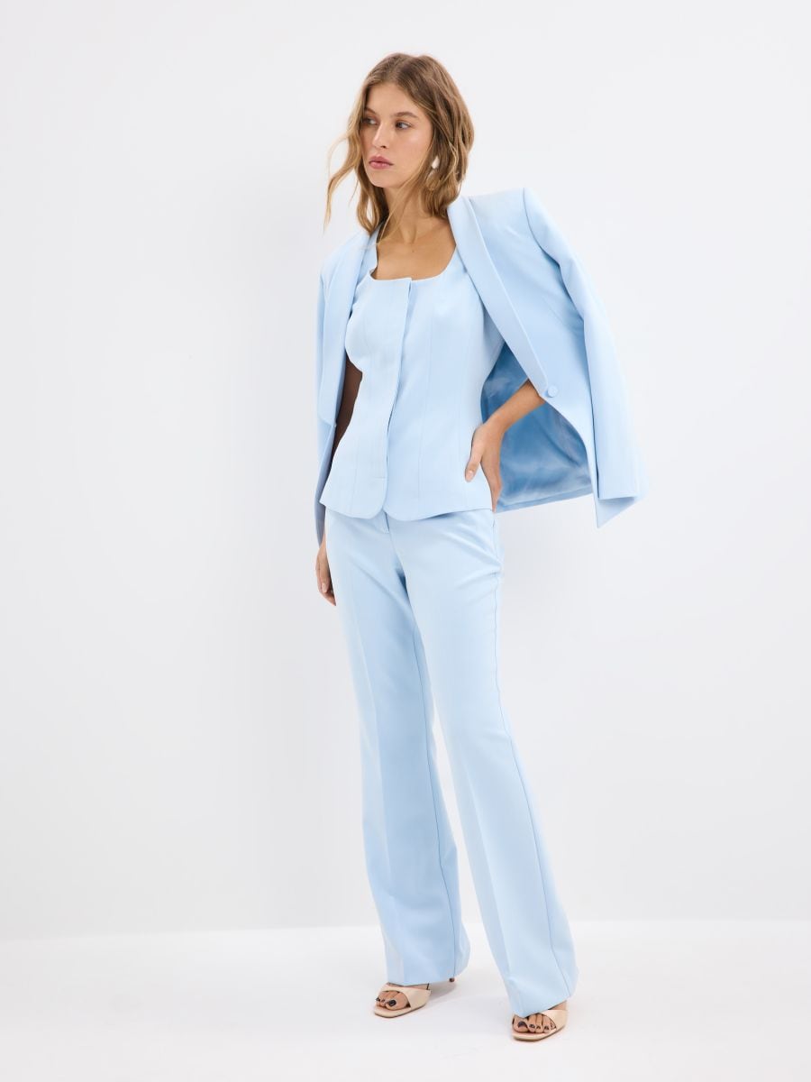 Błękitne spodnie flare - błękitny - MOHITO