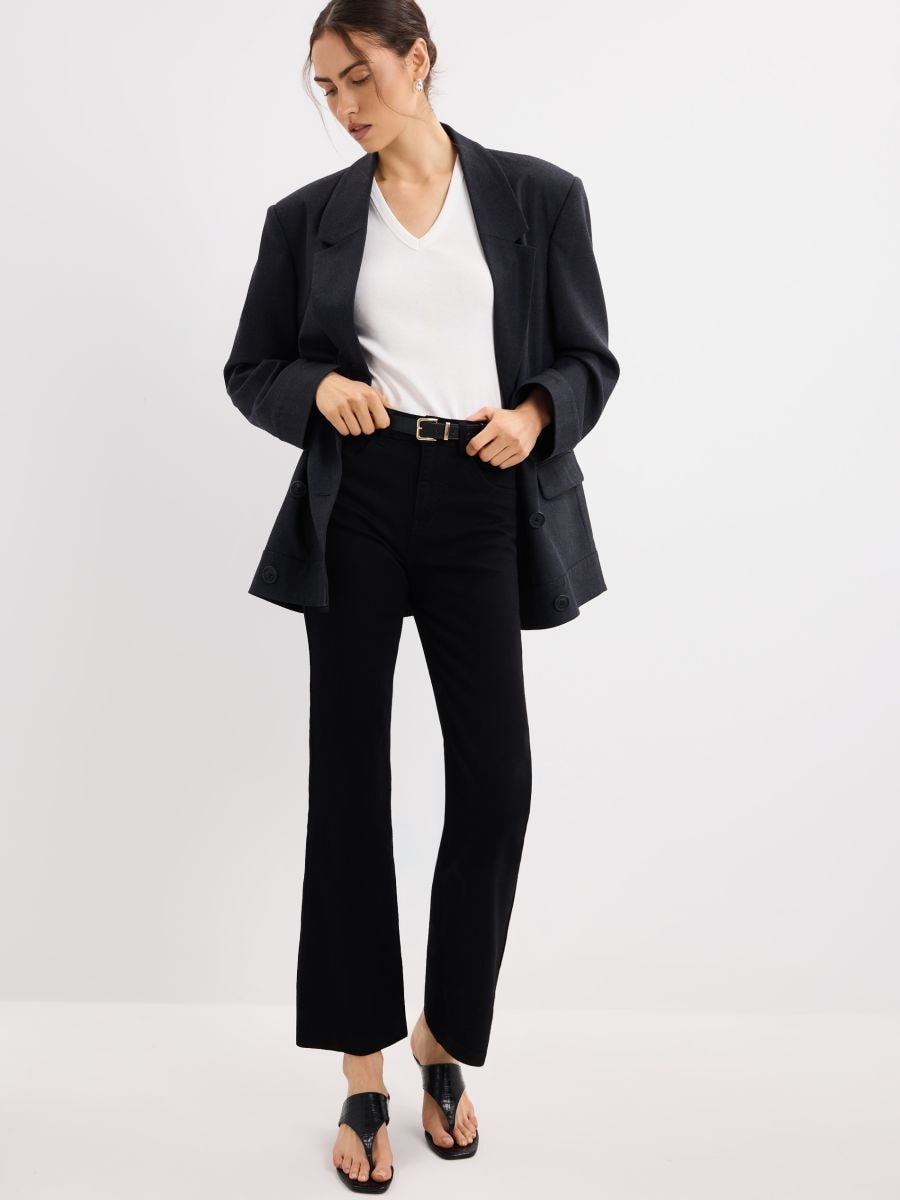 Jeansy bootcut z paskiem - czarny - MOHITO