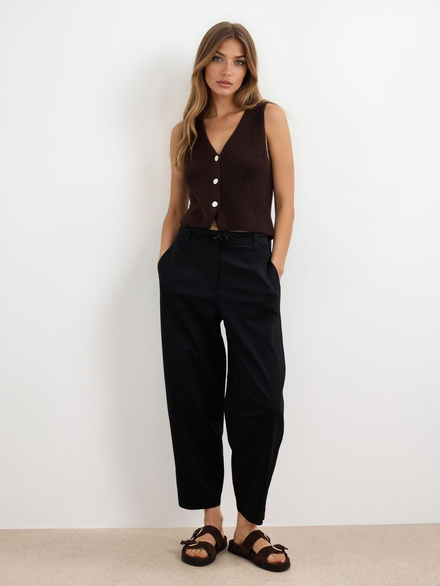 Spodnie slouchy - czarny - MOHITO