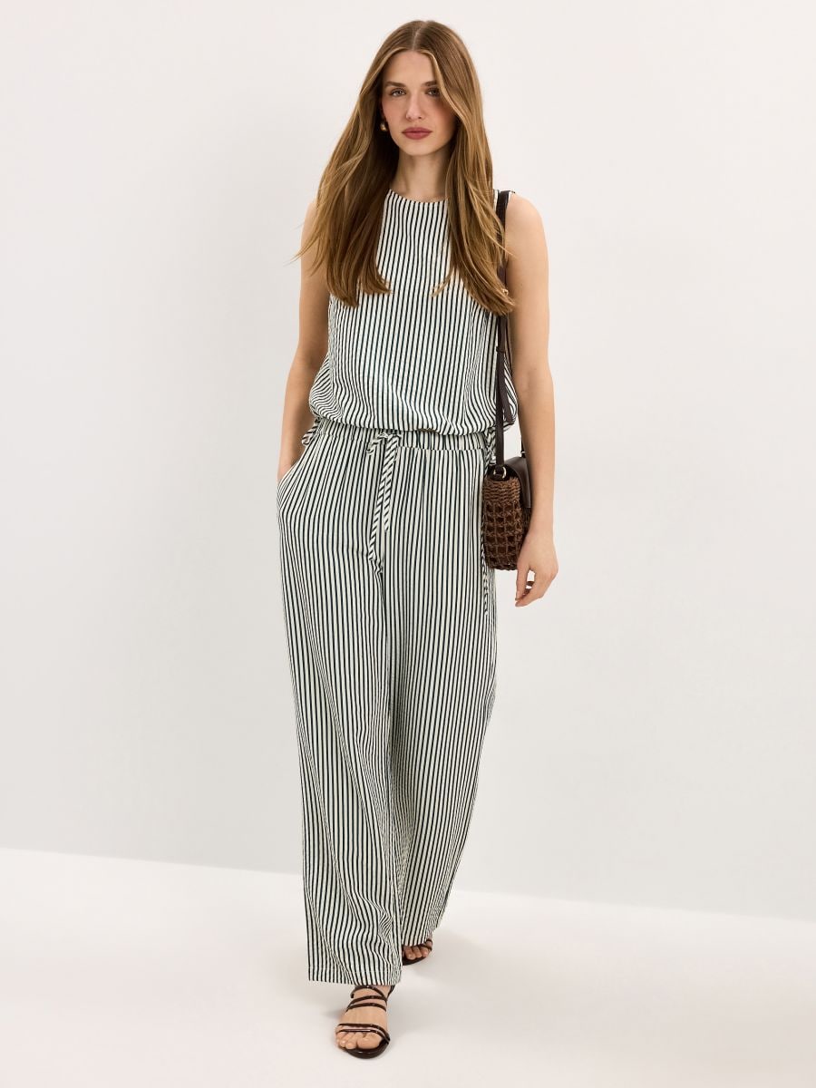 Spodnie w paski Spodnie w paski - zielony - MOHITO