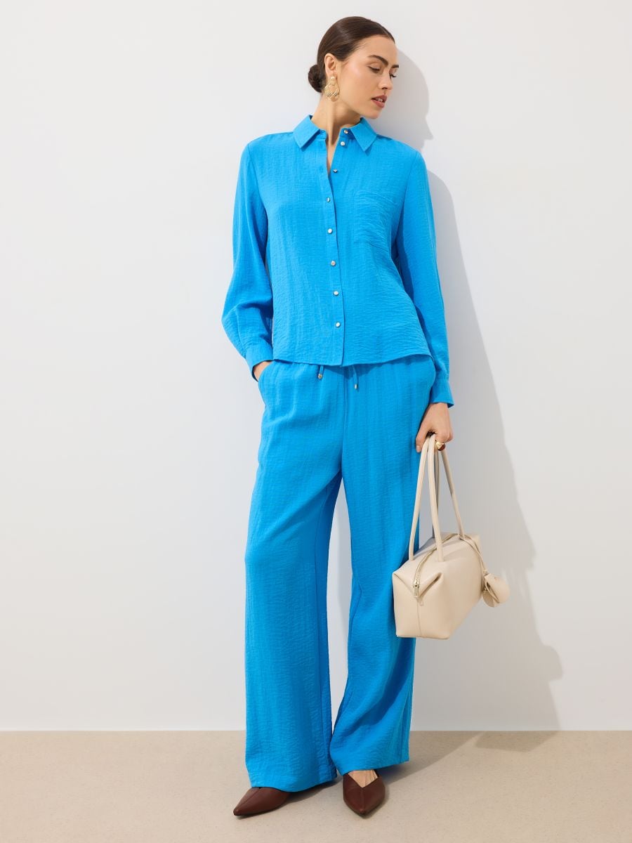 Niebieskie spodnie wide leg - fioletowy - MOHITO