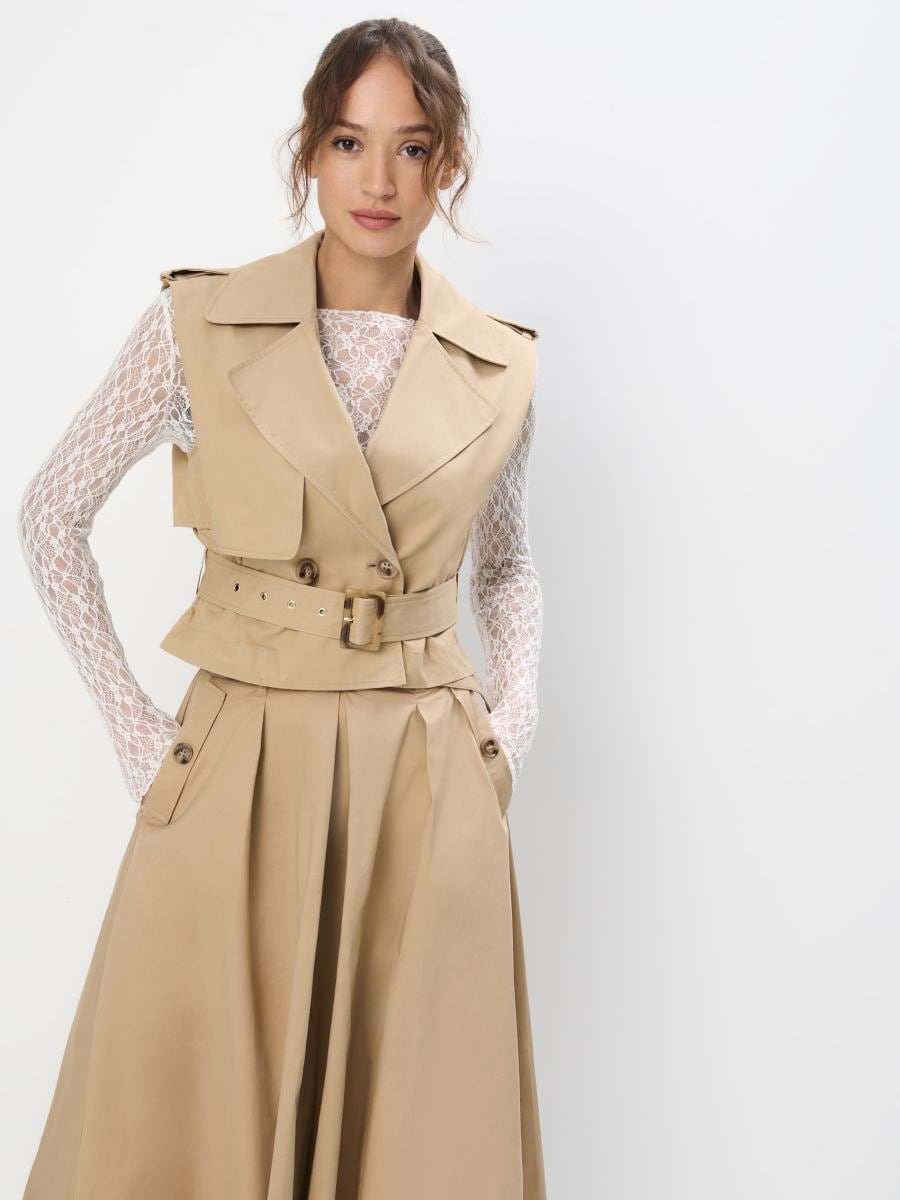 Bawełniana kamizelka z paskiem Bawełniana kamizelka z paskiem - beżowy - MOHITO