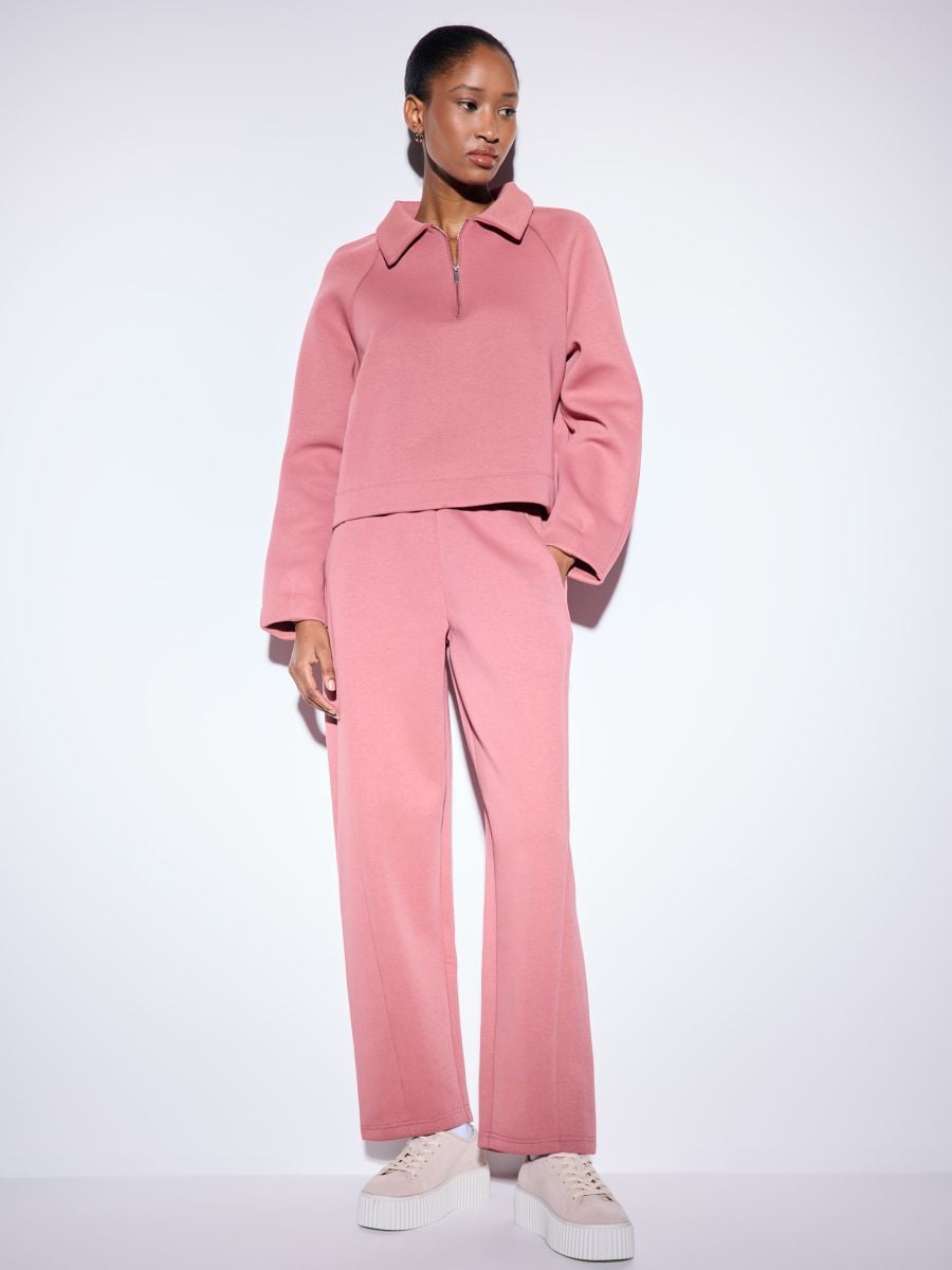Różowe spodnie dresowe Różowe spodnie dresowe - różowy - MOHITO