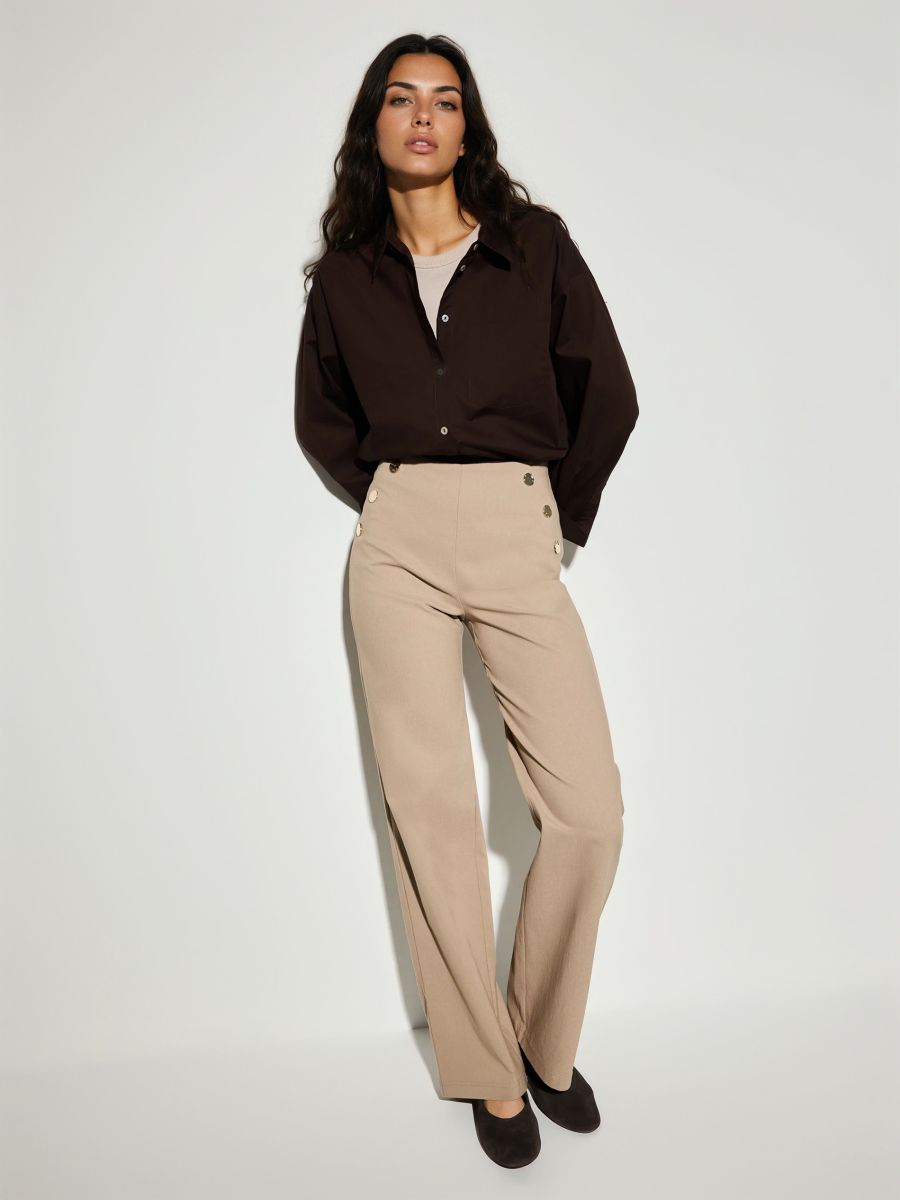 Beżowe spodnie z szeroką nogawką Beżowe spodnie z szeroką nogawką - beżowy - MOHITO