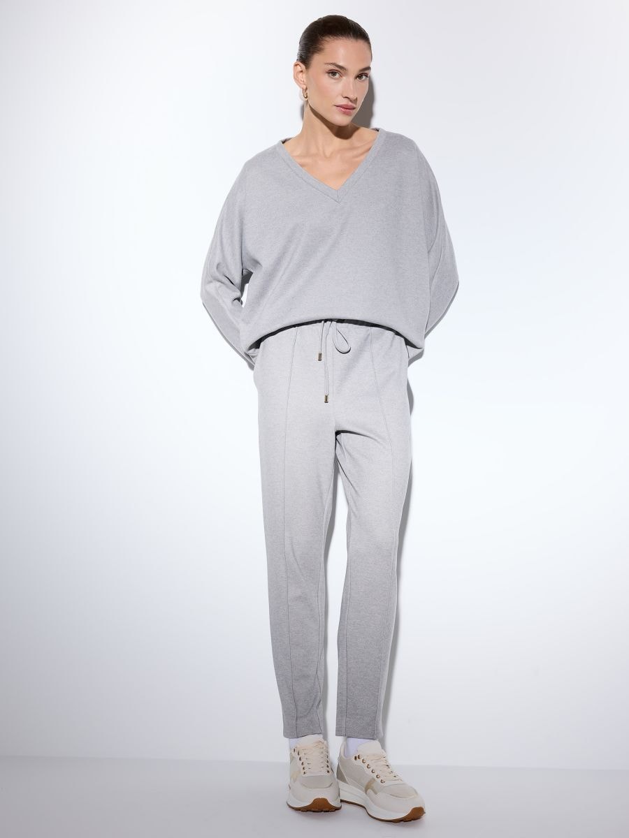 Szare spodnie dresowe - szary - MOHITO