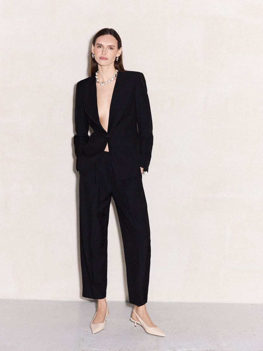 Spodnie slouchy - czarny - MOHITO