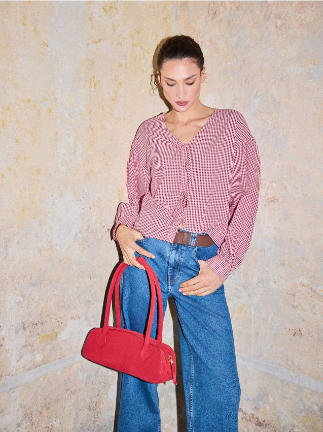 Bluză cu fundiță la gât