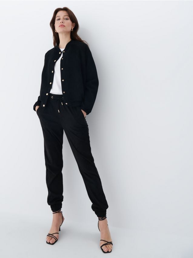 Spodnie joggery Kolor czarny - MOHITO - 2982I-99X