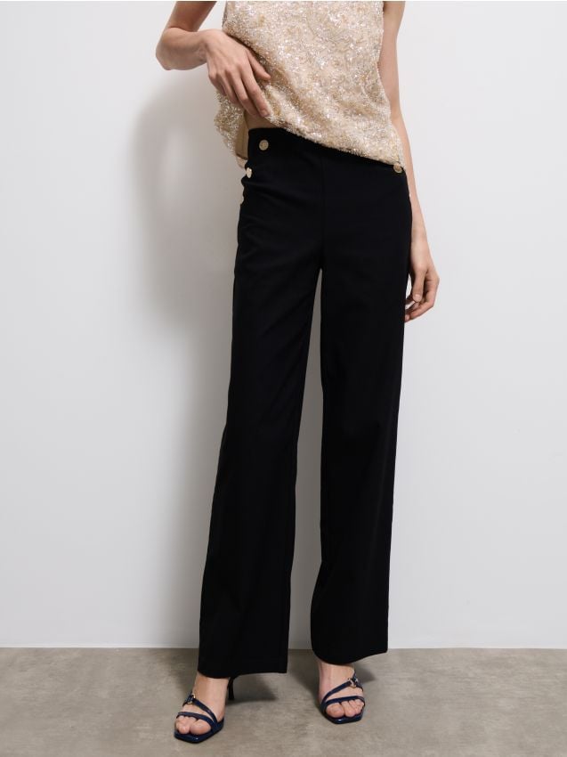 Pantaloni cu croi larg