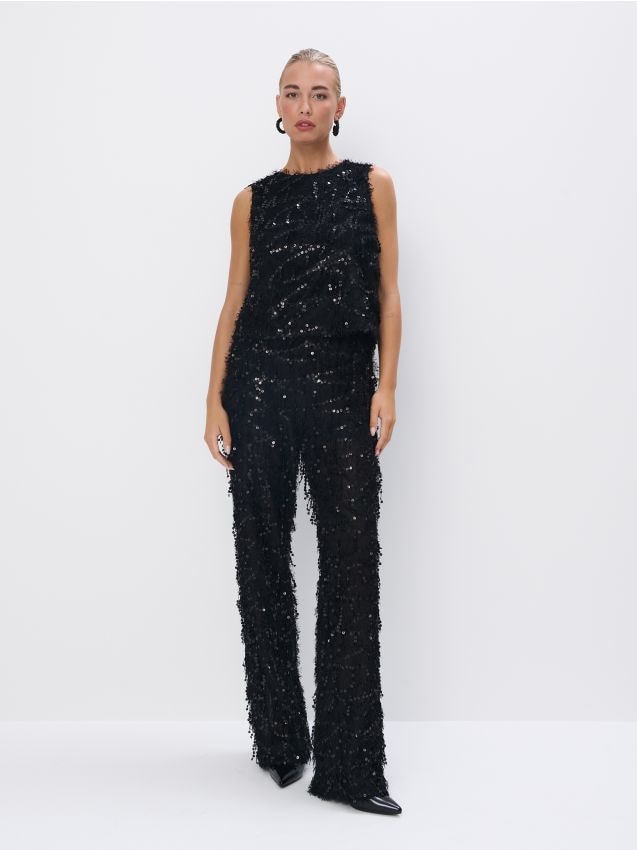 Pantaloni din paiete