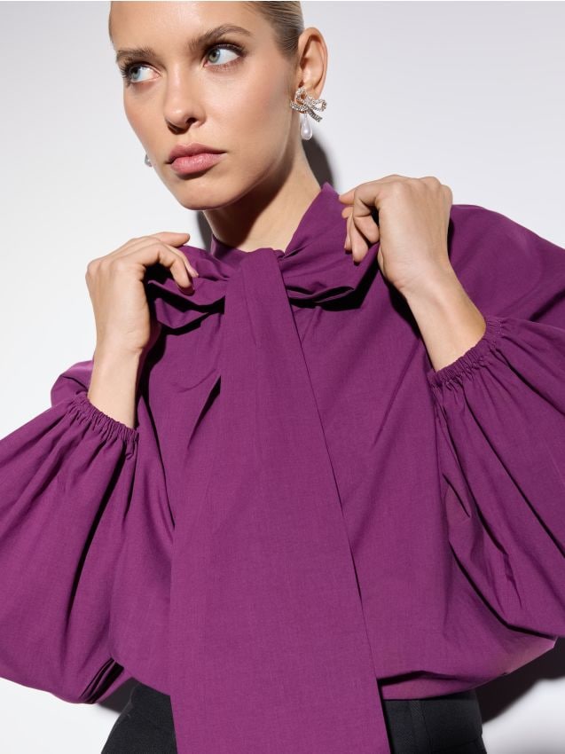 Bluză cu fundiță la gât