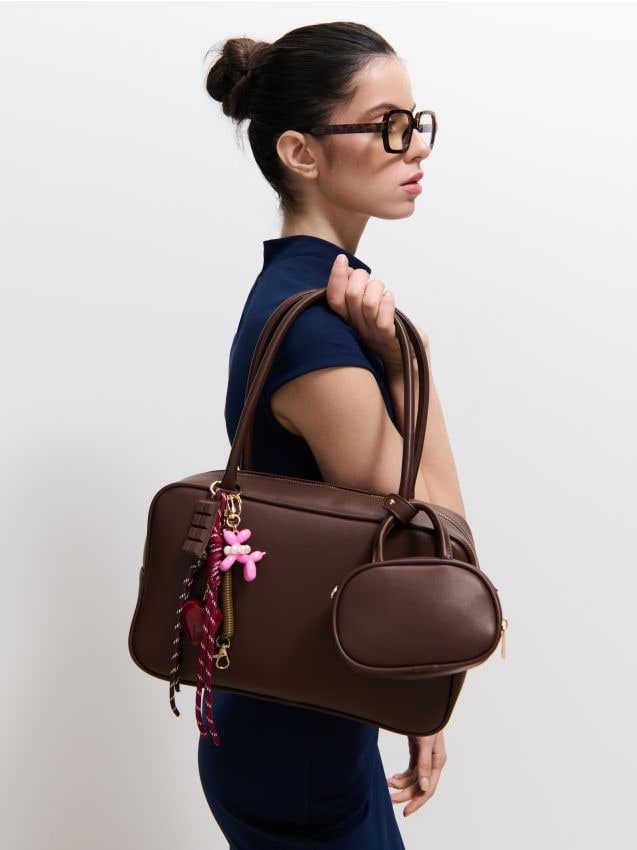 Geantă cu trusă cosmetică